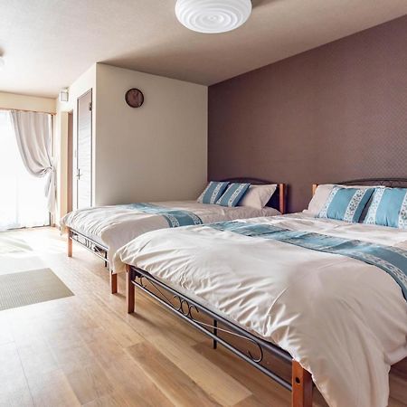 Tino Asuka Villa Osaka Bagian luar foto